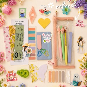 May include: A flat lay of stationery and accessories, including pens, stickers, bookmarks, and a notebook. The items are arranged with floral accents and the text "spring refresh" and "Stay Bookish".