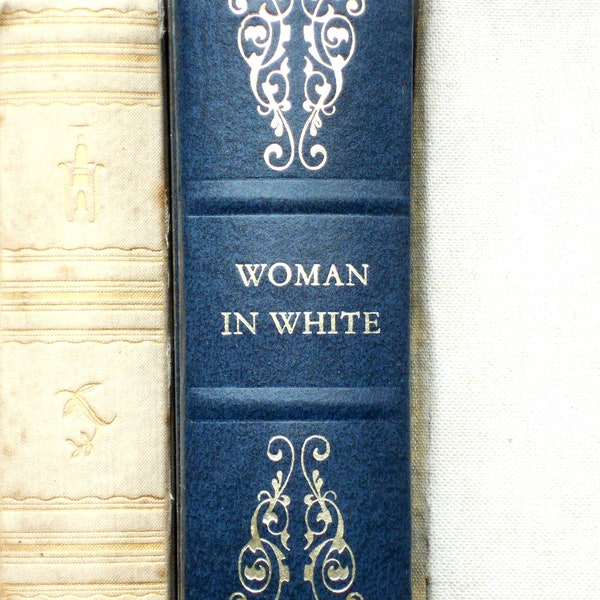 Wilkie Collins novel The Woman in White vintage book faux leather bound, in dark blue