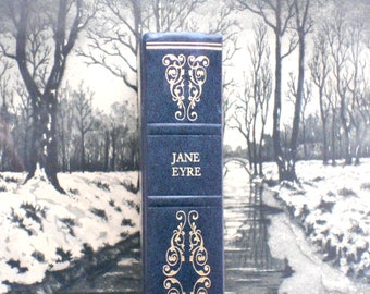 Jane Eyre book by Charlotte Bronte bound in dark blue faux leather