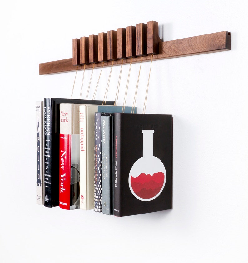 Custom made wooden book rack / bookshelf in Walnut. Pins also work as bookmarks. Bookcase image 2