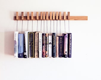 Book rack in Oak by AGUSTAV / Original design floating bookshelf / pins double as bookmarks / bookart / Hanging books / Unique book display.