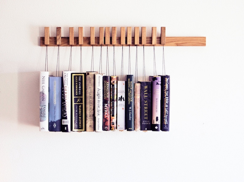 Book rack in Oak by AGUSTAV / Original design floating bookshelf / pins double as bookmarks / bookart / Hanging books / Unique book display. image 1