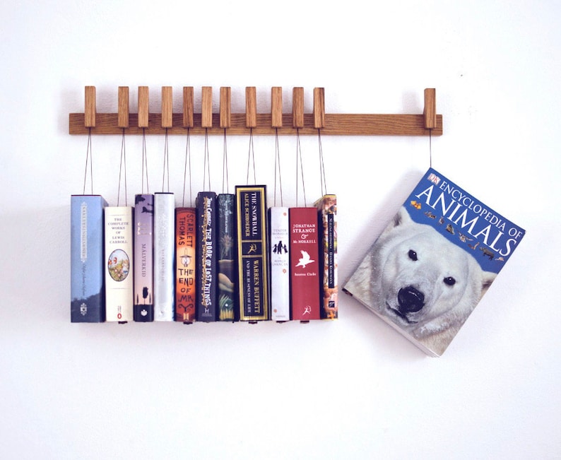 Book rack in Oak by AGUSTAV / Original design floating bookshelf / pins double as bookmarks / bookart / Hanging books / Unique book display. image 7