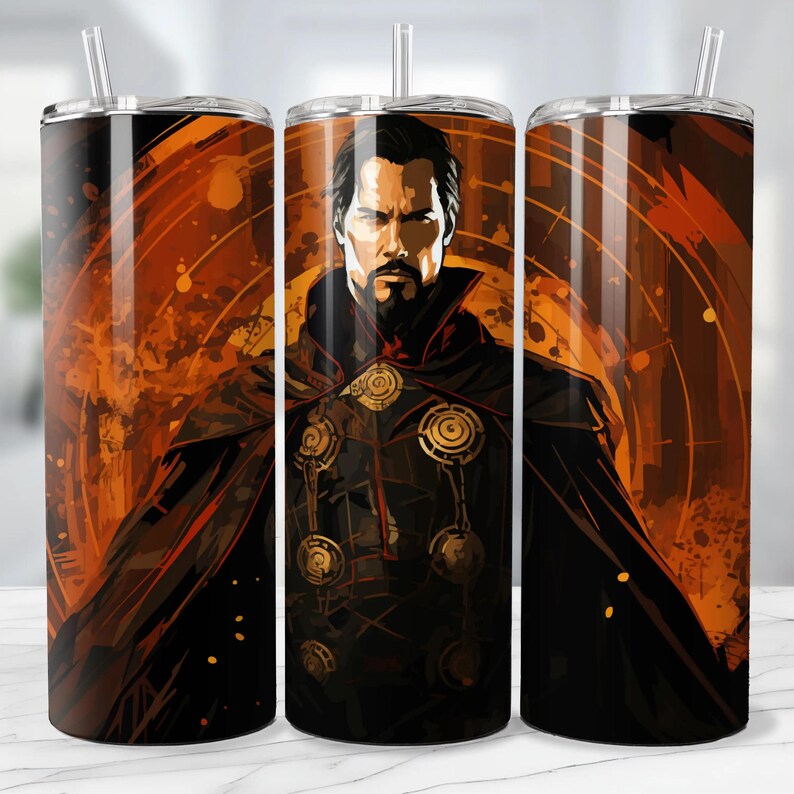May include: A stainless steel tumbler featuring a stylized illustration of Doctor Strange. The design showcases the character in a black cloak with gold accents, set against an orange and brown abstract background. Includes a clear straw.