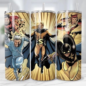 May include: A stainless steel tumbler featuring comic book style illustrations of several superheroes in action poses. The tumbler has a straw and a yellow and gold background with action lines.