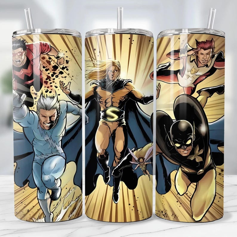 May include: A stainless steel tumbler featuring comic book style illustrations of several superheroes in action poses. The tumbler has a straw and a yellow and gold background with action lines.