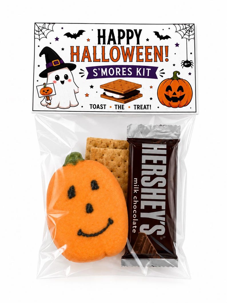 May include: A clear plastic bag containing a s'mores kit with a pumpkin-shaped cookie, graham crackers, and a Hershey's milk chocolate bar. The header card reads HAPPY HALLOWEEN! S'MORES KIT TOAST THE TREAT! with ghost and pumpkin graphics.