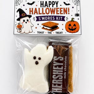 May include: A clear plastic bag containing a Halloween s'mores kit with a ghost-shaped marshmallow, a Hershey's milk chocolate bar, and a graham cracker. The header card features a ghost, a pumpkin, and the text HAPPY HALLOWEEN! S'MORES KIT.