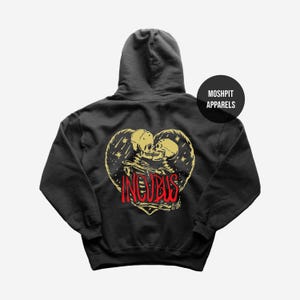 May include: Black hoodie with a heart-shaped design featuring two skeletons embracing. The word "INCUBUS" is printed in red. The hoodie also has the text "MOSHPIT APPARELS" in a black circle.
