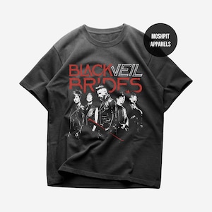 May include: Dark gray t-shirt featuring the band name "Black Veil Brides" in red and white block letters above a black and white graphic of the band members. The shirt also has the text "Moshpit Apparels" in a black circle.