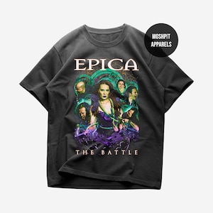 May include: Dark gray t-shirt featuring the band Epica. The shirt displays a graphic of the band members with the band's name in white and the text "The Battle" in a stylized font. The shirt has a crew neck and short sleeves.