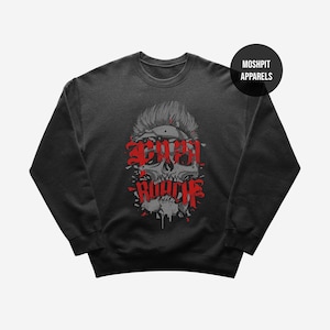 May include: Dark gray sweatshirt featuring a skull graphic with red text that reads "SCARY ROACH". The skull has a mohawk and is partially shattered. The sweatshirt has a crew neck and long sleeves. The brand name "MOSHPIT APPARELS" is in a black circle.