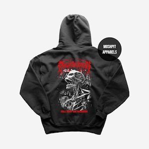 May include: Black hooded sweatshirt with a graphic of a skull and the text "FALL INTO THE DARKSIDE" in red. The sweatshirt also features the text "MOSHPIT APPARELS" in a black circle. The design is a black and white illustration.
