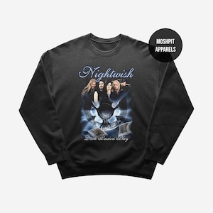 May include: Black crewneck sweatshirt featuring the band Nightwish. The design includes the band's name in a stylized font, a group photo, and the text "Dark Passion Play". A logo for Moshpit Apparels is in the upper right corner.