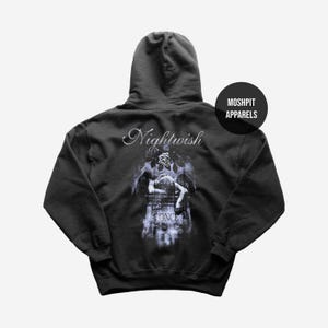 May include: Black hooded sweatshirt with the word "Nightwish" in cursive script across the upper back. A graphic of a figure on a tombstone is below the text. The brand name "Moshpit Apparels" is on a black circle.