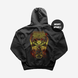 May include: Dark grey hoodie with a graphic design on the back. The design features a skull with horns, and the text "MOSHPIT APPARELS" is on the upper right. The graphic is in shades of yellow, red, and brown.