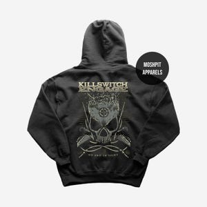 May include: Dark gray hoodie featuring a skull graphic with the text "KILLSWITCH ENGAGE" above and "NO END IN SIGHT" below. The skull design includes crossbones and a compass. The hoodie has a hood and a round "MOSHPIT APPARELS" logo.