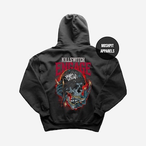 May include: Dark gray hoodie featuring a skull graphic with the text "KILLSWITCH ENGAGE" in red. The skull has a black bandana and is surrounded by flames. The text "DISARM DESCENT" is also visible.