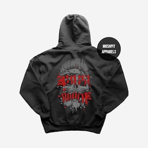May include: Dark gray hoodie featuring a skull graphic with red text that reads "BEACH ROACH". The skull has a mohawk and is surrounded by red splatters. A black circle with "MOSHPIT APPARELS" is on the upper right.