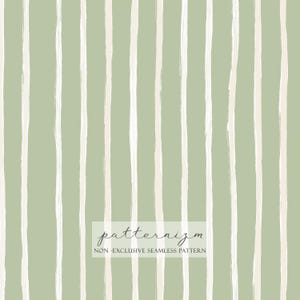 May include: A seamless pattern featuring vertical, hand-painted white stripes on a soft green background. The design includes the text "patternizm" and "NON - EXCLUSIVE SEAMLESS PATTERN". This pattern is suitable for various design applications.
