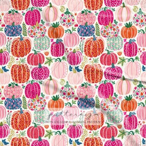 May include: A seamless pattern with pumpkins in pink, orange, and blue, with floral and patterned designs. The pumpkins are set against a white background with green leaves and vines. The text "patternizm" is visible.