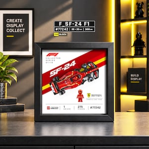 May include: A framed display featuring a red Formula 1 SF-24 race car model and a matching driver minifigure. The print includes the text F1 Collector Series 01/10, Ferrari Formula One Team, LEGO Speed Champions, 1 Driver, 275 Pieces, and #77242.