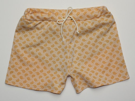 mustard yellow swim trunks
