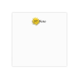May include: A white square notepad with the text "ST Note" in black, accompanied by a yellow sunburst logo. The notepad is clean and simple, suitable for various note-taking purposes.