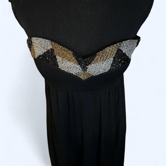 bebe black strapless dress Buy Womens Tube Top Midi 4 at Casual dresses The Bebe Strapless Cutout Slim Midi Dress features a fitted silhouette with a unique front ring detail that creates a stylish cut bebe | Dresses | Bebe
