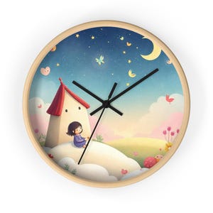 May include: Round wall clock with a light wood frame. The clock face features a whimsical illustration of a girl sitting near a house with a red roof, under a starry night sky with a crescent moon and butterflies. The clock hands are black.