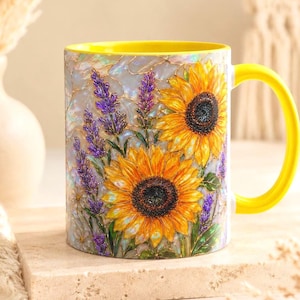 May include: A ceramic mug with an 11 oz capacity, featuring a vibrant print of yellow sunflowers and purple lavender sprigs against a shimmering, iridescent background. The mug has a bright yellow handle and a matching yellow interior rim.