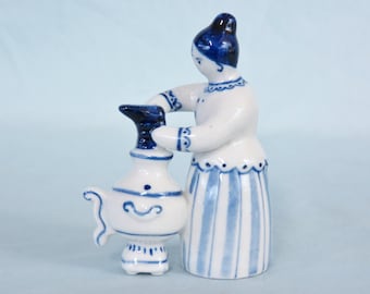 Made USSR Vintage Blue and White Figurine Woman Drying Shoe on Stove