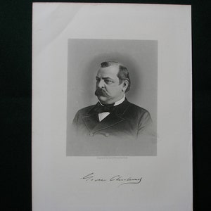 May include: A black and white portrait of a man with a mustache and a bow tie. The man is wearing a suit jacket and a white shirt. The image is signed "Grover Cleveland".