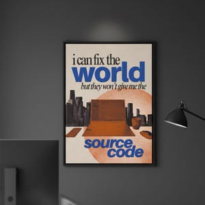 May include: A framed poster with the text "i can fix the world but they won't give me the source code." The image features a laptop, cityscape, and a circular design in orange and blue tones. The poster is in a black frame.