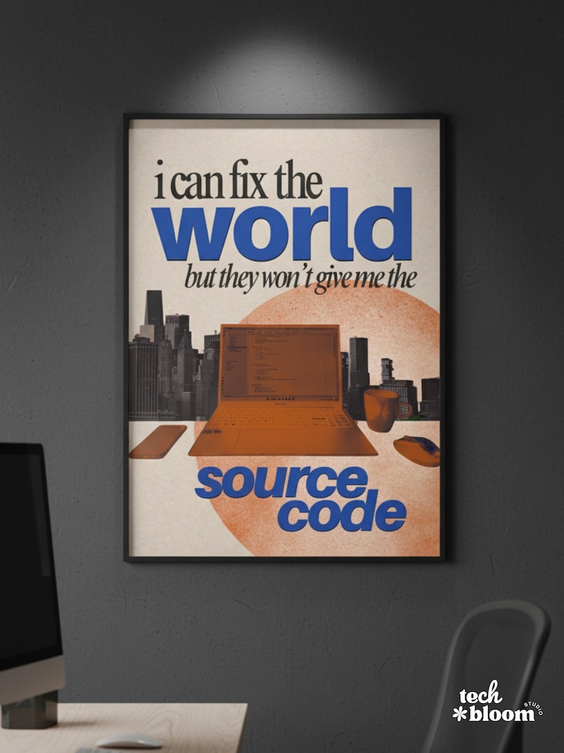 May include: A framed poster with the text "i can fix the world but they won't give me the source code." The image features a stylized orange laptop, mouse, and cityscape silhouette. The poster has a retro design with a tech studio logo.