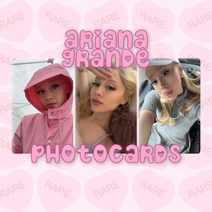 May include: A set of three rectangular photocards featuring images of Ariana Grande, set against a light pink background patterned with heart shapes and the word RARE. The text ARIANA GRANDE PHOTOCARDS is displayed in a pink bubble font.