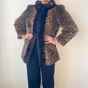 Vintage faux fur leopard coat, long 80s animal print jacket with black fur trim, warm retro statement coat, size L, made in France