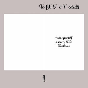 May include: A folded greeting card with a white interior and a light brown exterior. The text "Have yourself a merry little Christmas" is printed in black script. The card is designed to fit 12.7cm x 17.8cm cards.