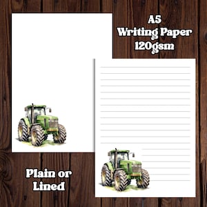 May include: A5 writing paper, available plain or lined, with a watercolour illustration of a green tractor. The paper is 120gsm. The image shows two sheets of paper, one plain and one lined, with the tractor design.