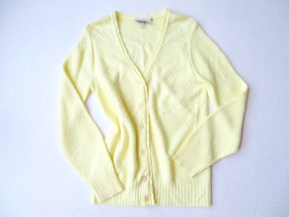 yellow cardigan