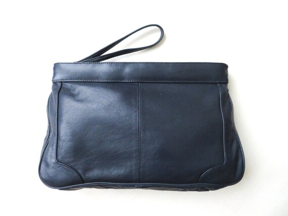 navy leather clutch bag