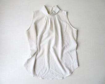 sleeveless top with turtleneck & cut-in shoulders, halter style blouse, cream white polyester, vintage 80s 90s, Dina Ariel, women small