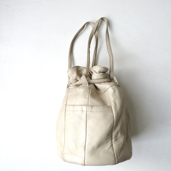 drawstring bag, small beige leather bucket bag, round shape, vintage 60s, handcrafted handbag, creasing & slightly soiled