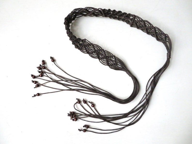 Vintage 60's 70's dark brown macrame belt to wear at waist or hips tie closure made on cord with wooden beads.