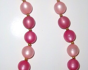 Superbes nuances vintage de collier de perles roses