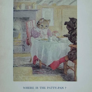 May include: An illustration from a children's book depicts a cat and a dog at a table. The cat, wearing a pink dress, sits at the table, while the dog stands on a chair. The text "WHERE IS THE PATTY-PAN?" is at the bottom.