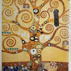 May include: A print of Gustav Klimt's "The Tree of Life". The artwork features a stylized tree with swirling branches and spiral patterns in shades of gold and brown. The base of the tree has colorful floral elements, with a black bird perched in the branches.