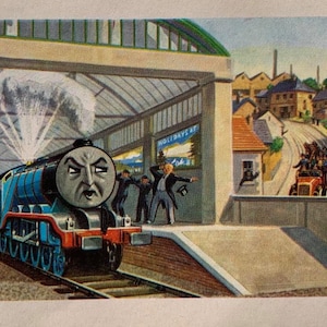 May include: Illustration of a blue steam train with an angry face, spewing steam. The train is on a track, with people waving from a platform. The sign reads "HOLIDAYS AT". A vintage style image.