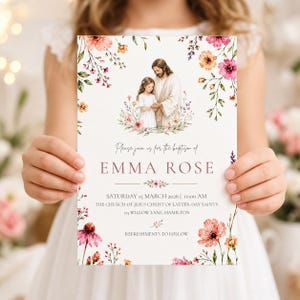 May include: A baptism invitation featuring a watercolor illustration of Jesus and a young girl. The invitation is adorned with floral accents in pink, orange, and green. Text includes "Please join us for the baptism of EMMA ROSE" and event details.