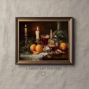 May include: Framed still life painting featuring oranges, lit candles, and glasses of red liquid. A clear glass bottle and a sprig of greenery are also visible. The text "CARMY ART POSTERY" is at the bottom of the frame.